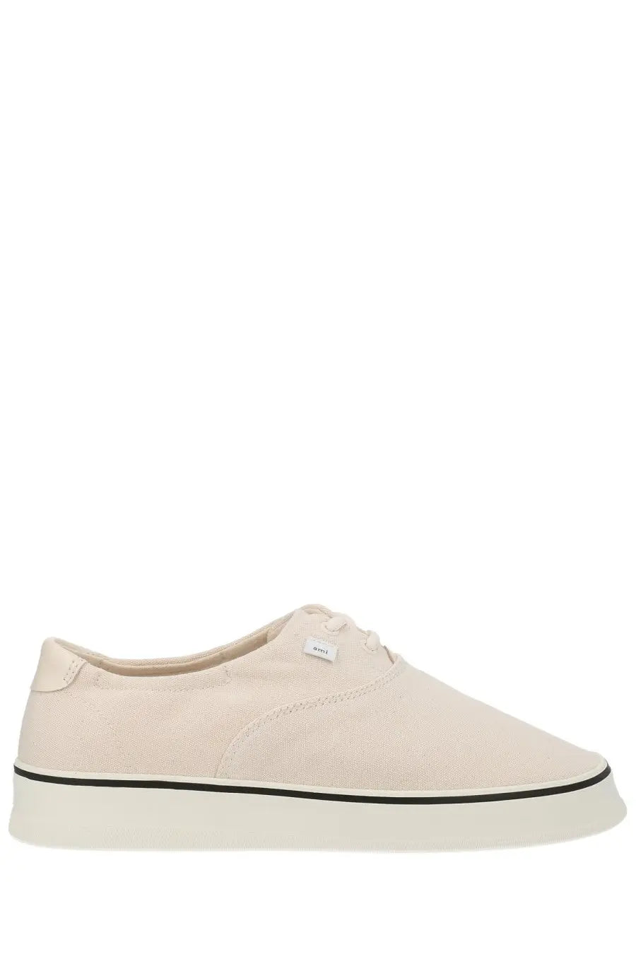 Ami paris unisex tennis sneaker white cream-colored canvas low-top with black rubber sole and stitching details