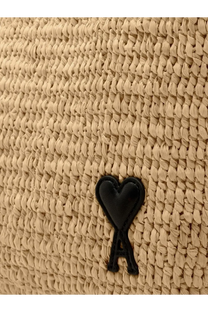 Beige woven straw ami paris women’s raffia shoulder bag with black heart shaped logo and a underneath in white