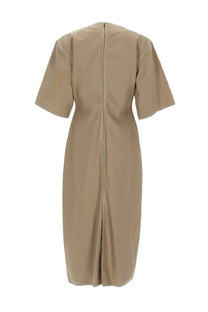 Beige fitted midi dress by ami paris with short sleeves and central back zipper shown from the back side