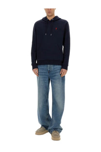 Ami paris women’s navy blue cotton hoodie with a small red embroidered logo on the chest