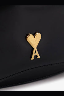 Ami Paris women’s black leather shoulder bag clutch with gold-tone heart shaped logo featuring an a at base