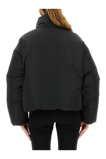 Ami Paris women’s black puffer jacket with high collar and quilted padded design for cold weather
