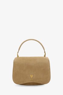 Beige suede ami paris women’s crossbody bag miel with gold-tone heart-shaped logo and matching handle