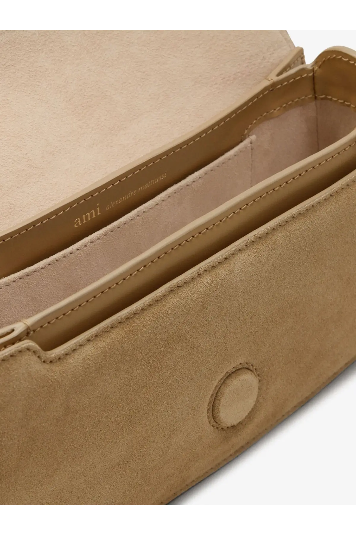 Beige suede crossbody bag with minimalist design and subtle stitching details from Ami Paris MIEL collection