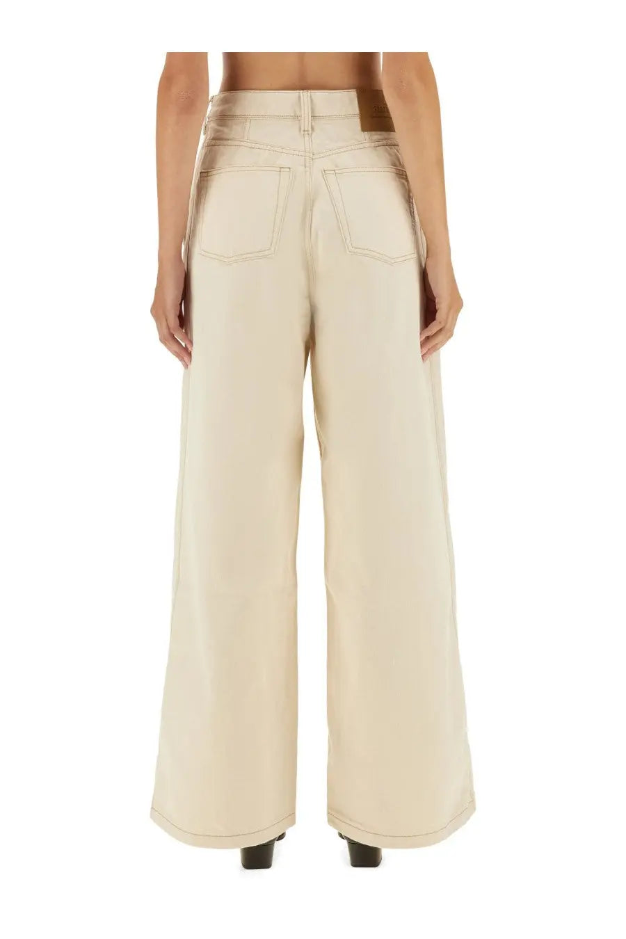 Beige wide-leg denim trousers with a high waist and classic back pockets designed by Ami Paris shown from the back