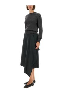 A dark gray textured knit sweater with ribbed cuffs and hem complementing the ami paris women’s wool wrapped skirt gray
