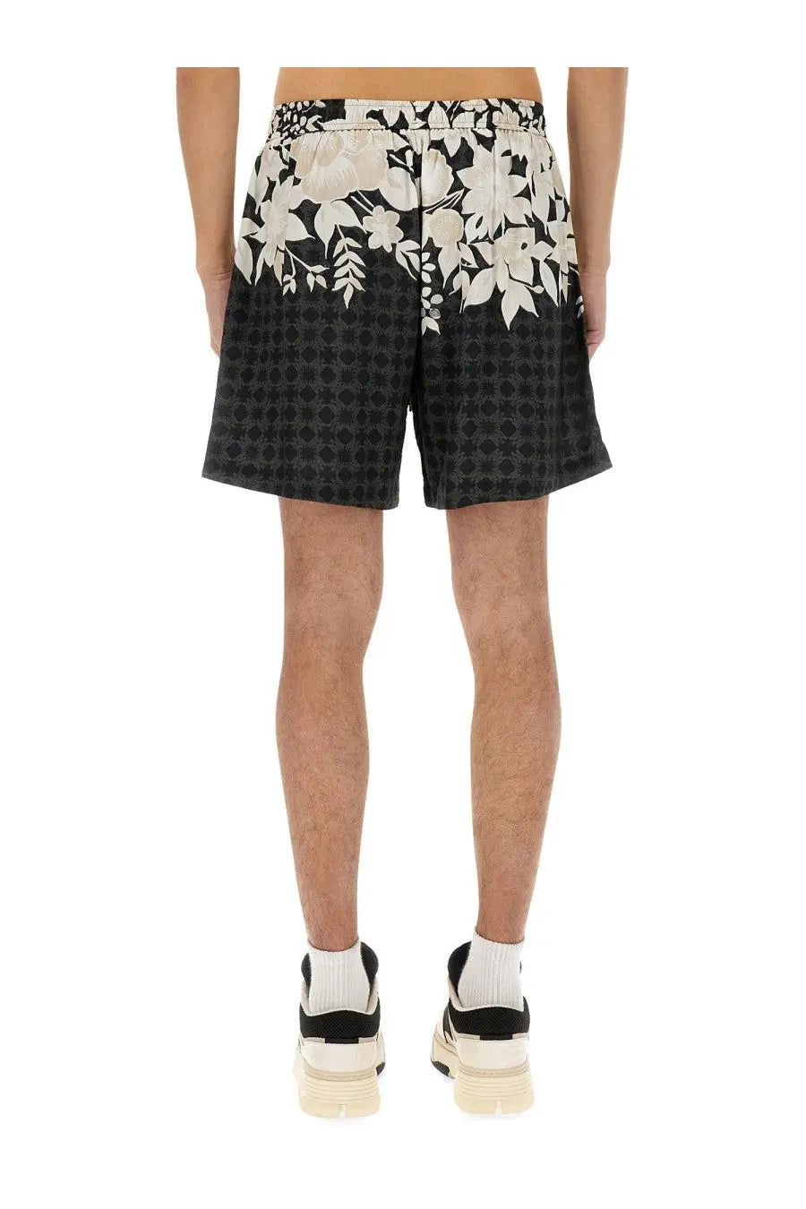 Amiri men’s bermuda garden black shorts with black and white floral pattern and textured dotted lower section