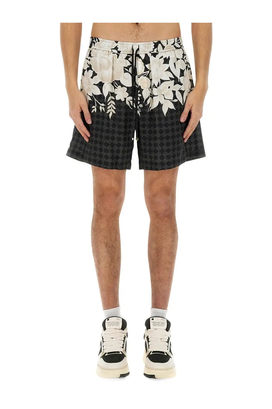 Amiri men’s bermuda garden black shorts with black and white floral pattern and checkered lower section