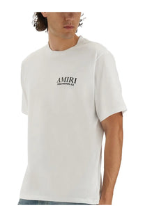 Amiri men’s white cotton t-shirt with black amiri hollywood ca logo printed on the chest