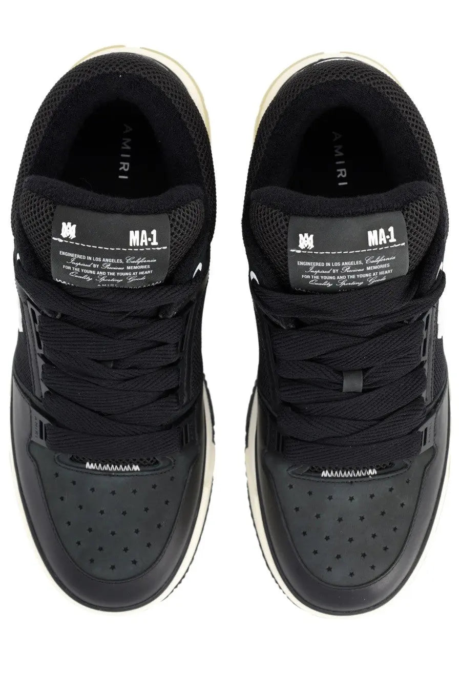 Amiri men’s sneaker ma black featuring black perforated leather uppers with white laces and soles in athletic design