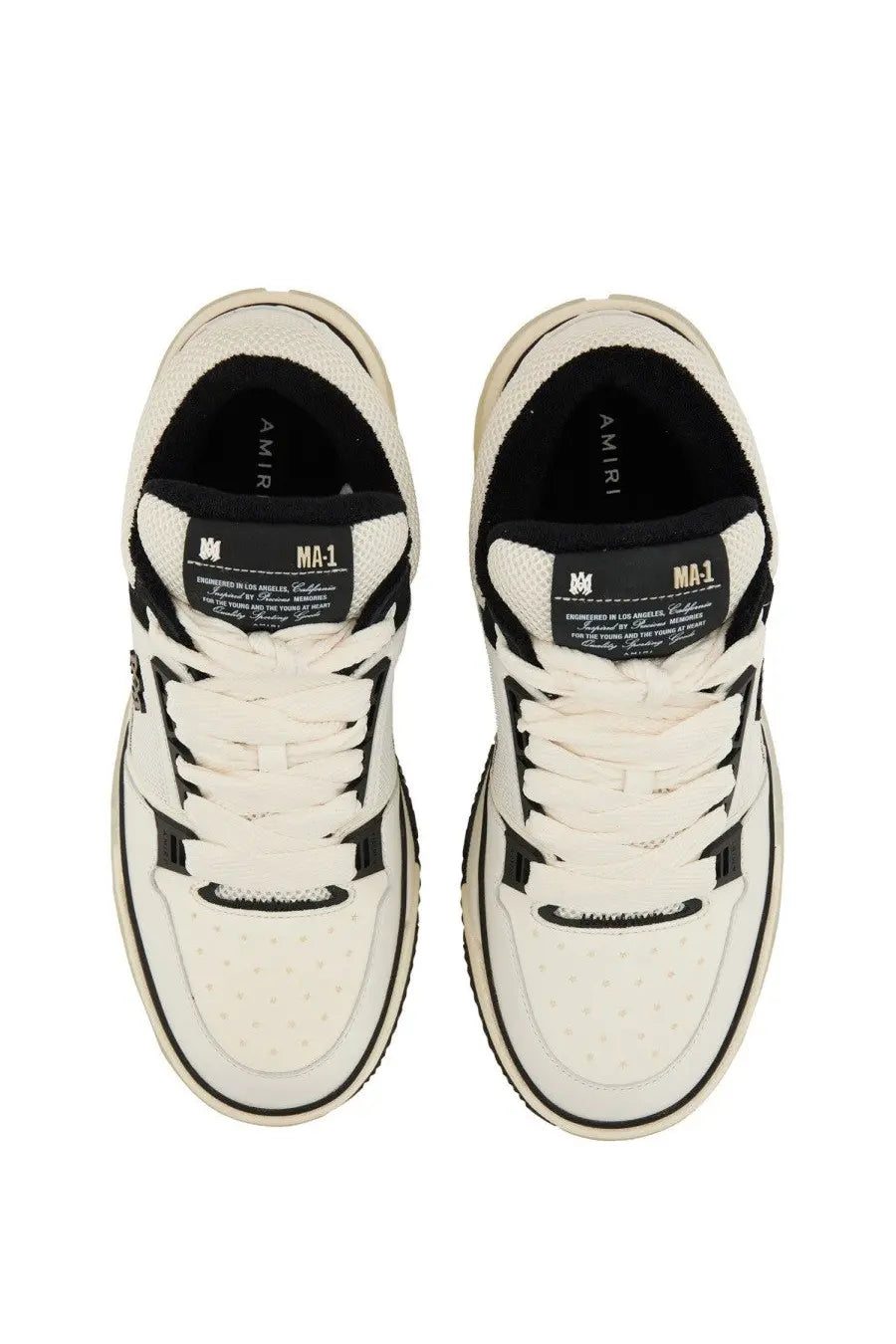 Amiri men’s sneaker ma white in white and black with perforated uppers and contrasting rubber soles