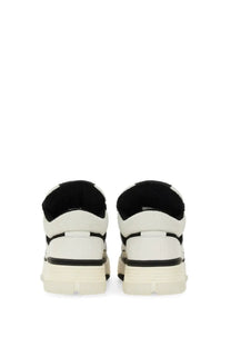 Amiri men’s sneaker ma white chunky sneaker with white and black mesh upper rubber sole and black heel tab back view