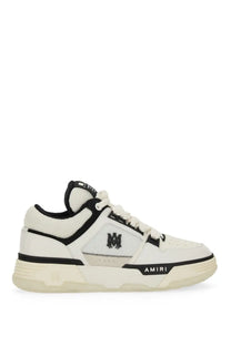Amiri men’s sneaker ma white featuring white and black mesh and leather upper with bold logo on side