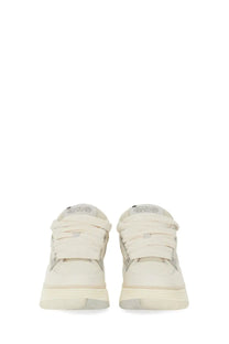 Cream-colored amiri men’s sneaker ma white with chunky sole and multiple lace-like straps across the upper