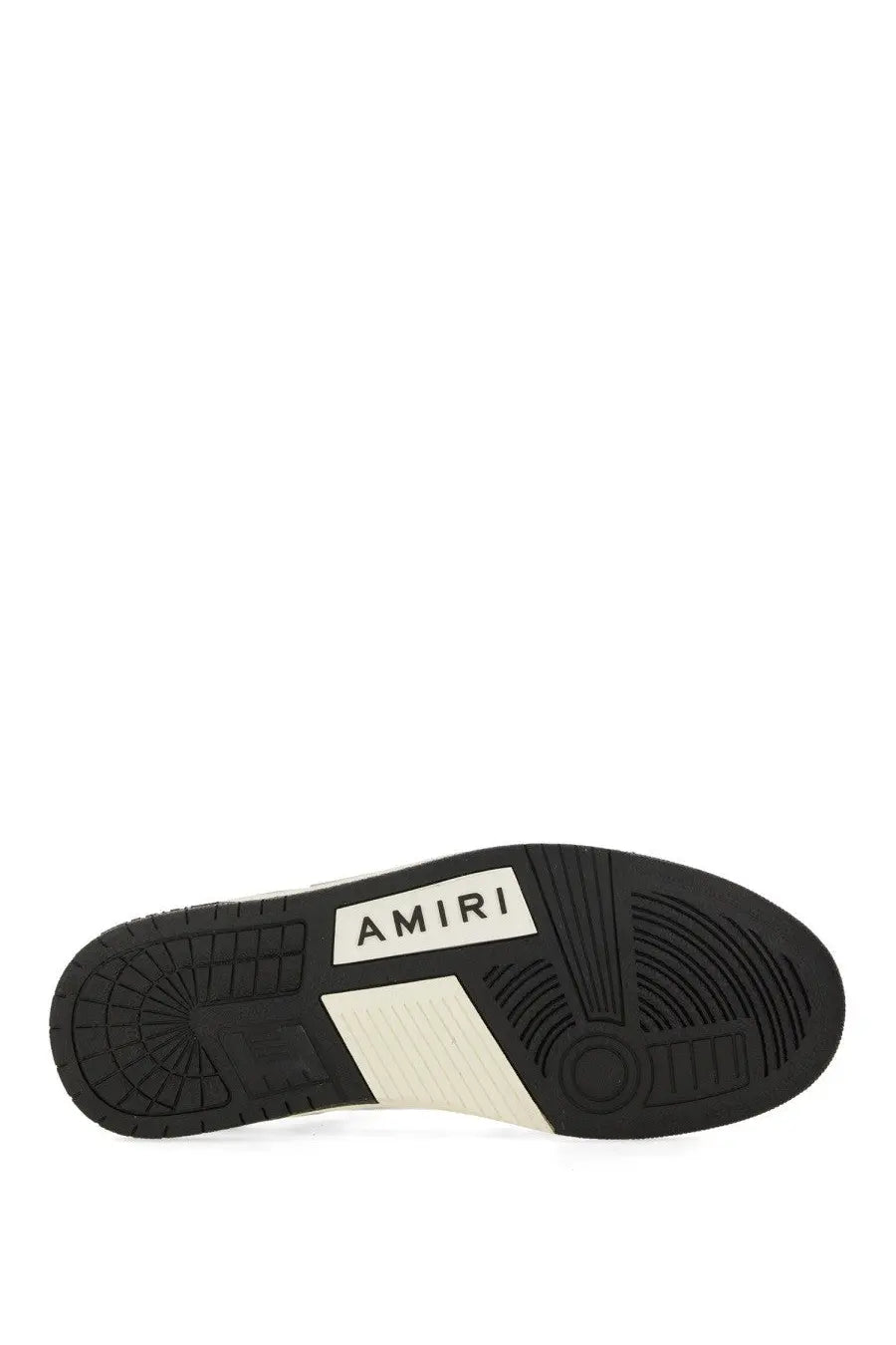 Black rubber sole with white amiri branding and geometric tread on AMIRI men’s sneaker skel black back side