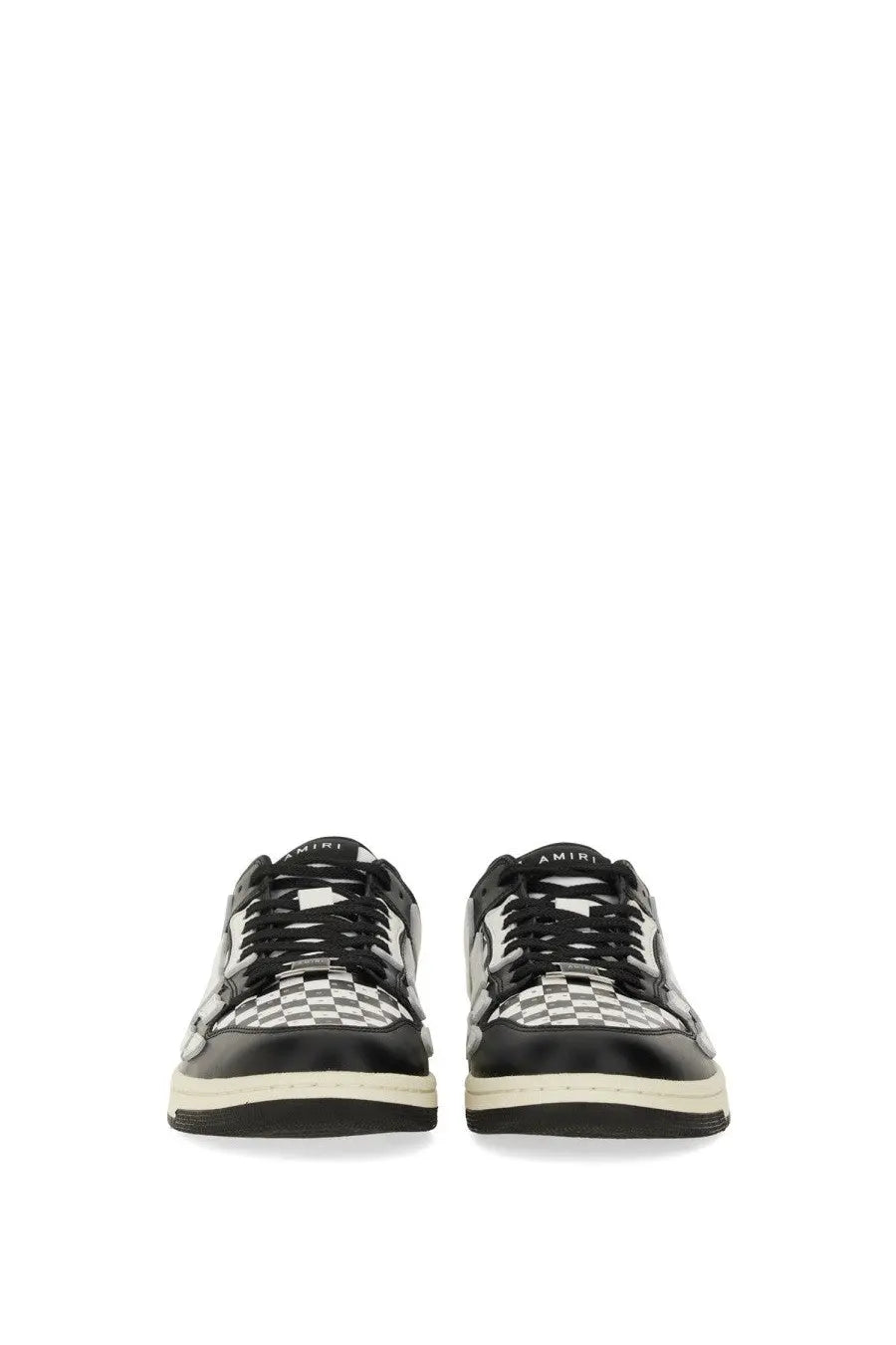 Amiri men’s black low-top sneaker with glossy black and white checkerboard pattern and amiri branding on the tongue