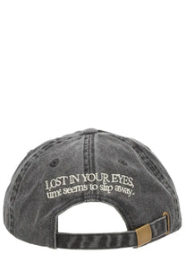 Dark gray denim Amish Supplies men’s baseball cap with white embroidered text lost in your eyes time seems to slip away