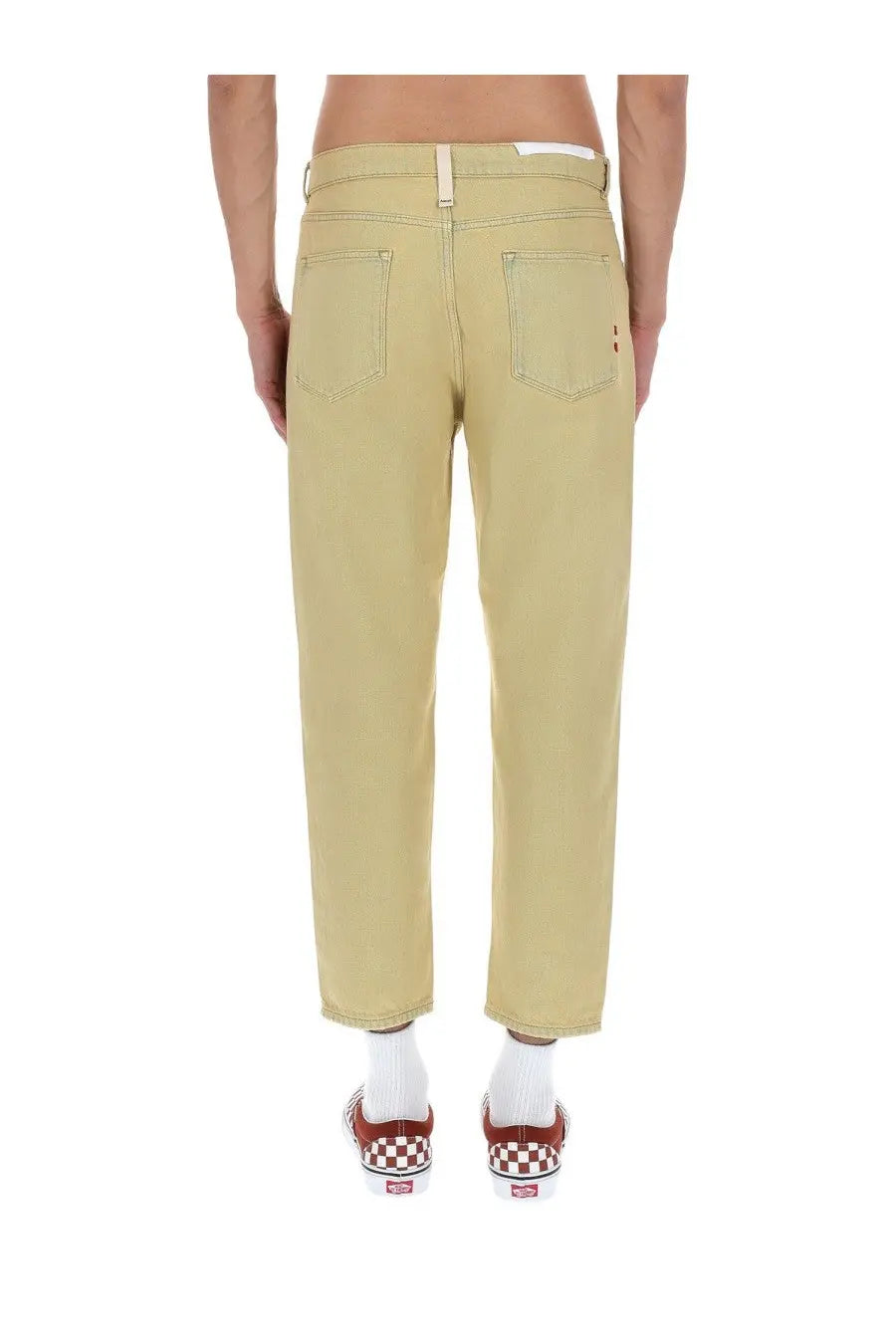 Beige denim jeans with relaxed fit and subtle red stitching on back pockets shown from the back side