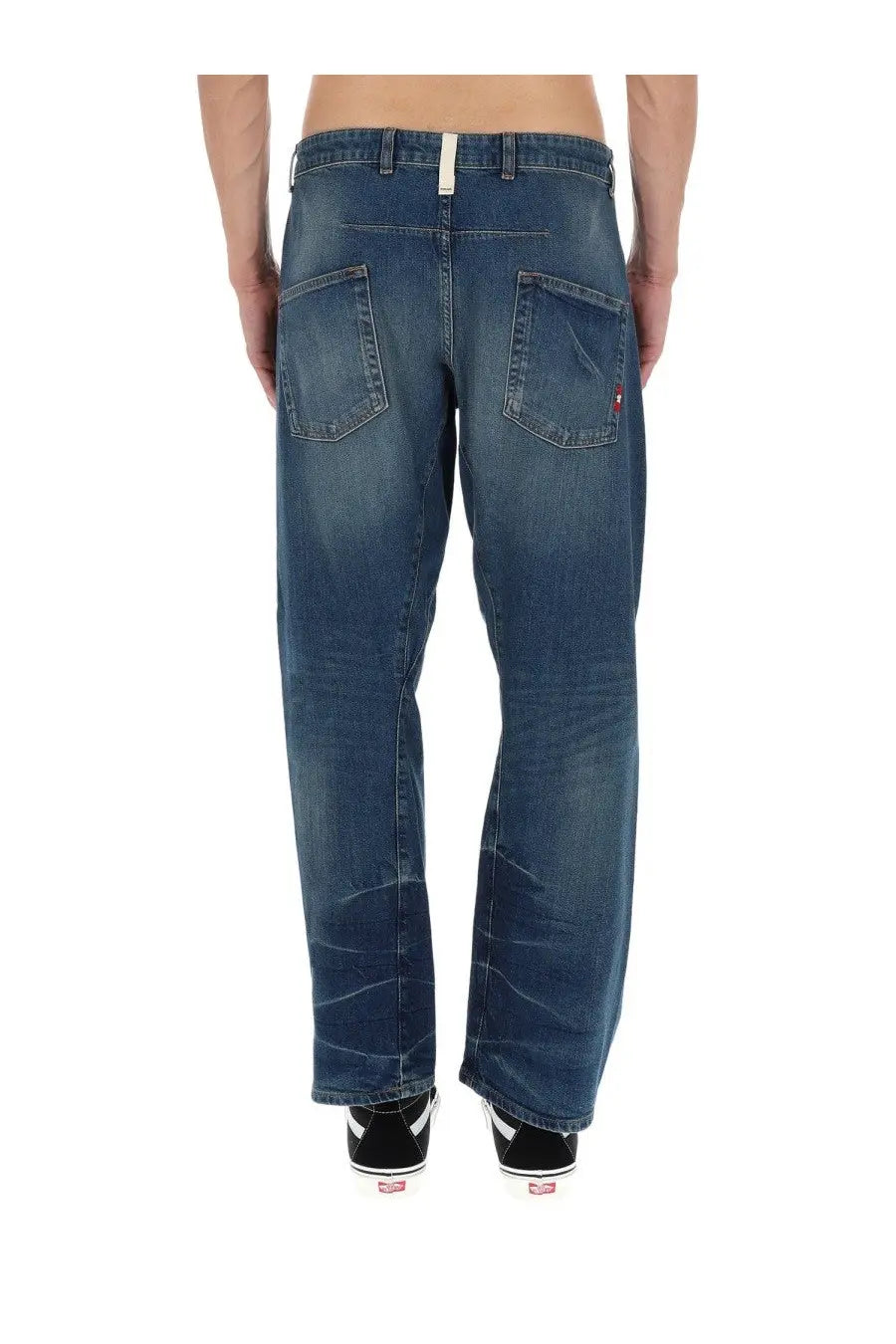 Dark blue denim amish supplies men’s jeans twist slub blue with faded wash and classic back pockets shown from the back side