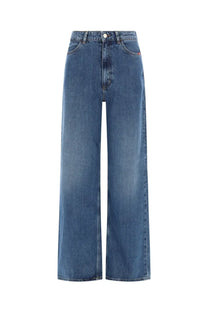 Back side of amish supplies women’s jeans linda blue high-waisted wide-leg denim with classic stitching and red tag