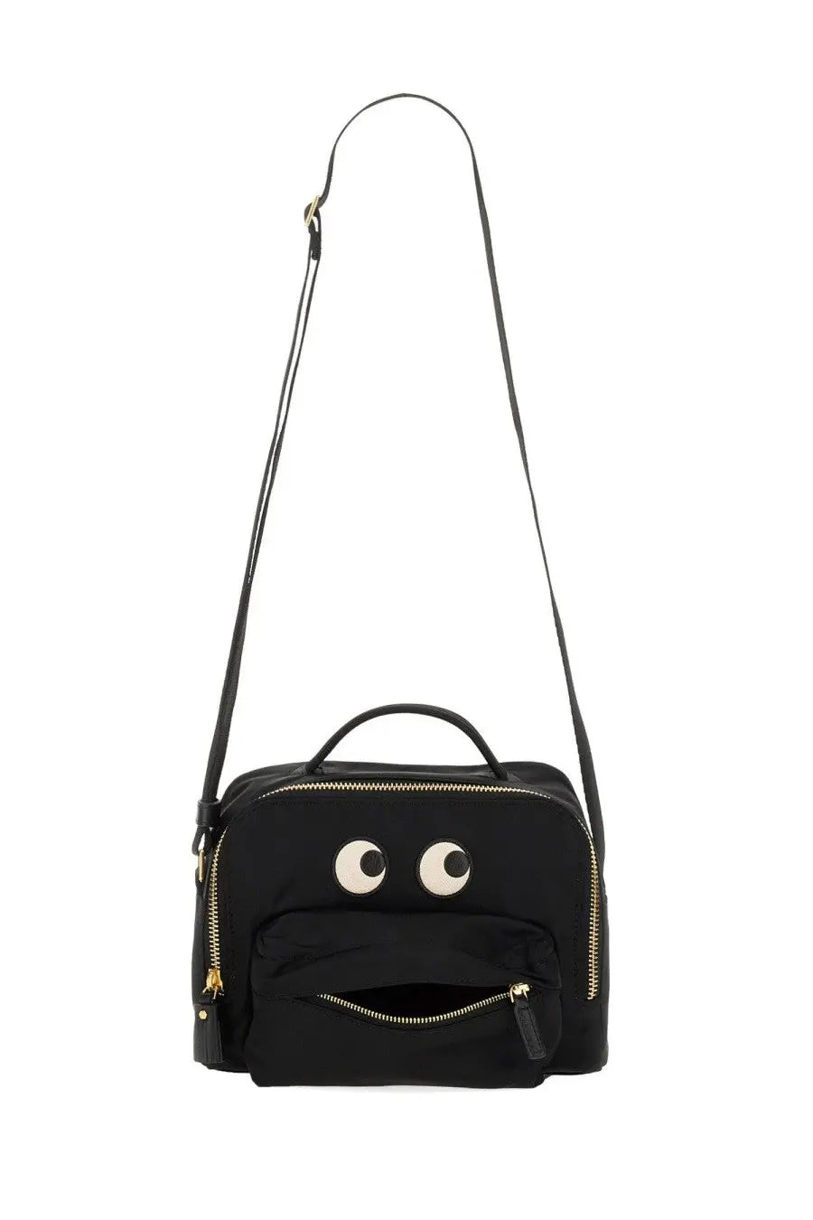 Anya Hindmarch women’s black canvas crossbody bag with playful embroidered eyes and zipper-mouth design