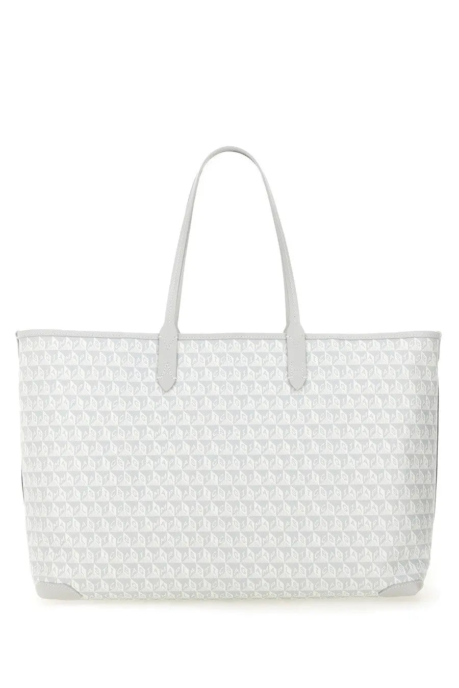 Anya Hindmarch women’s blue AM plastic tote bag with white repeating geometric pattern and matching handles