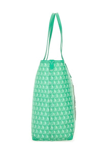 Anya hindmarch women’s mint green tote bag with white geometric pattern and matching handles