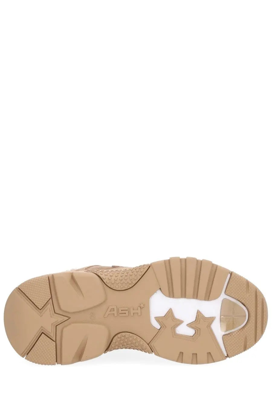 Tan rubber sole with white star-shaped cutouts and embossed ash branding on ash women’s addict bis fur sneaker brown