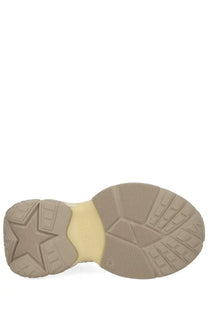 Tan rubber sole with star-shaped tread and pale yellow midsole on ash women’s dragon sneaker beige
