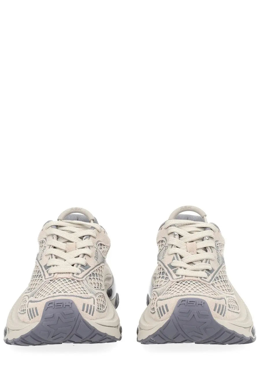 Beige mesh ash women’s dragon sneaker with gray rubber soles seen from the back showing ash branding on the heel