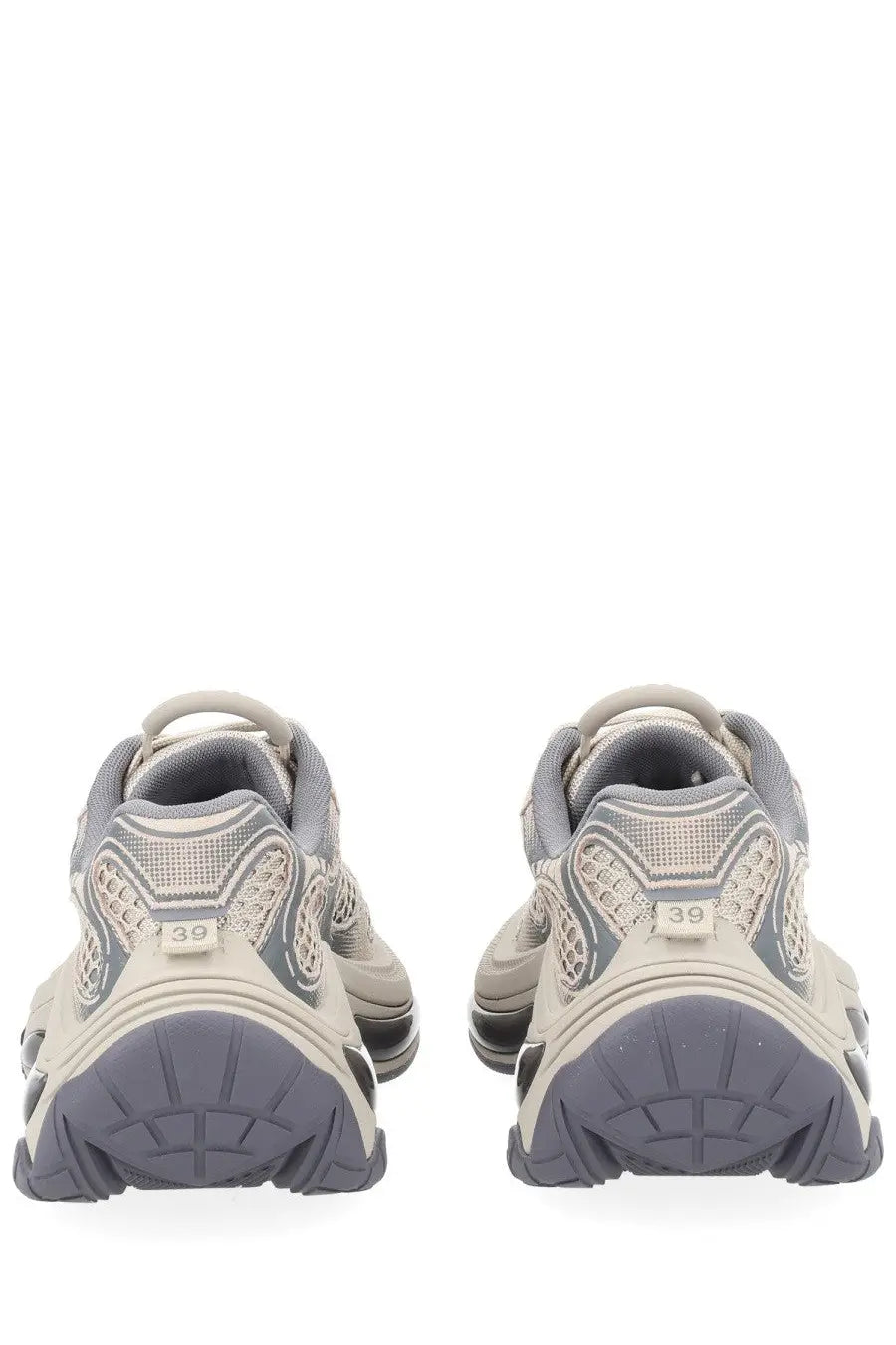 A pair of beige and gray balenciaga triple s sneakers with chunky textured sole in ash women’s dragon sneaker grey design