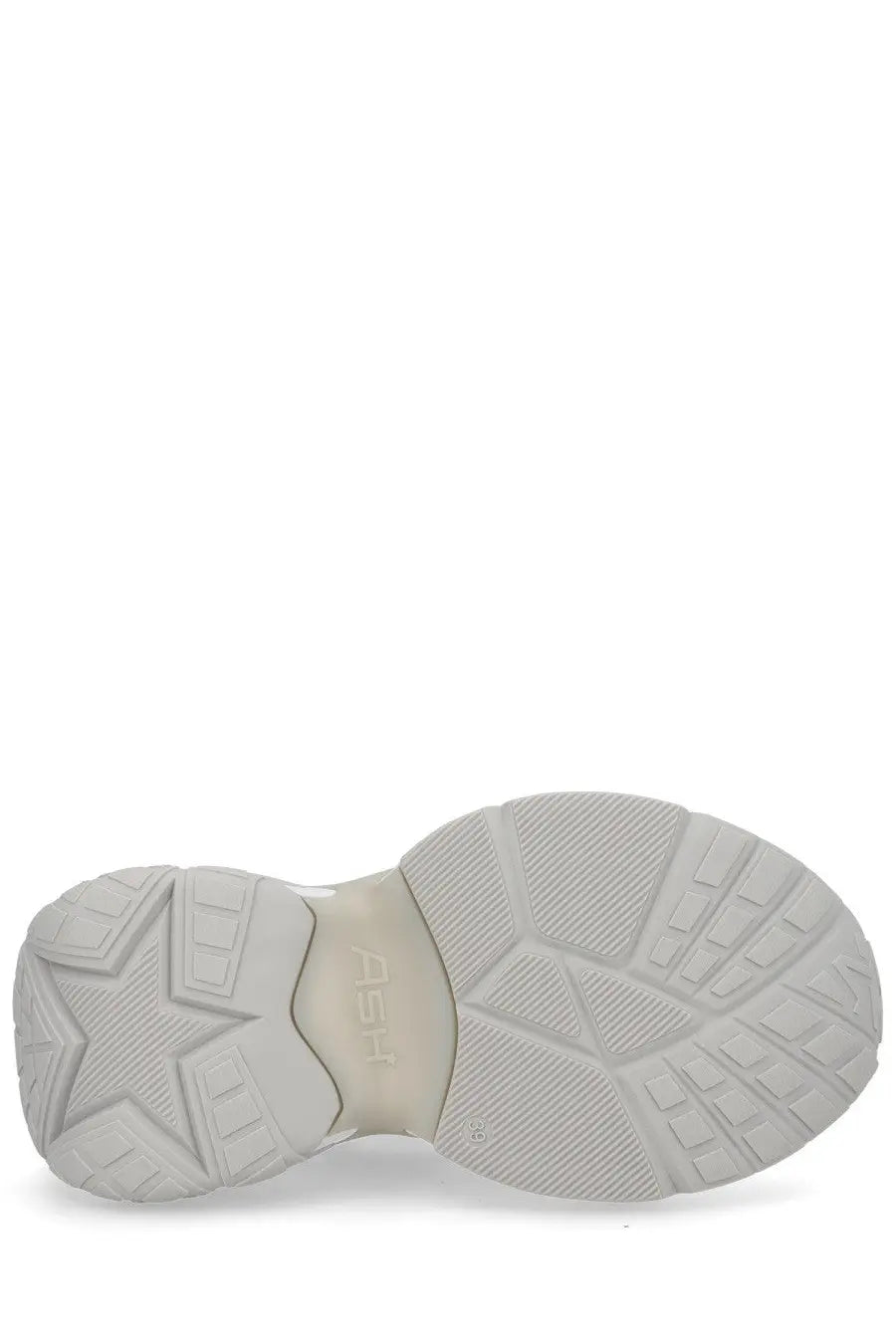 Light gray rubber sole with geometric tread and ash brand embossed on the heel of ash women’s dragon sneaker white back side