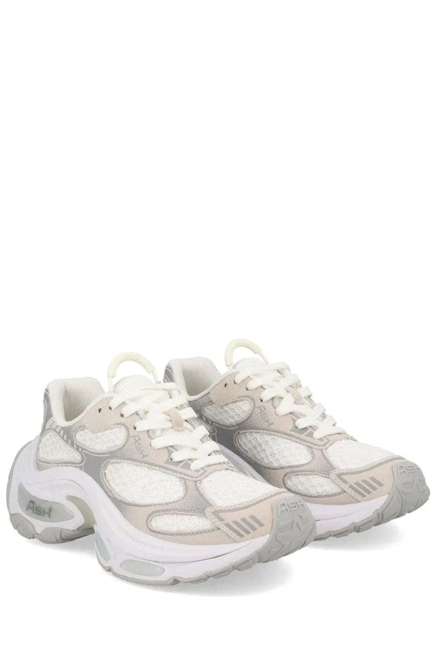 A pair of ash women’s dragon chunky off-white and gray athletic sneakers with mesh panels and bold rubber soles