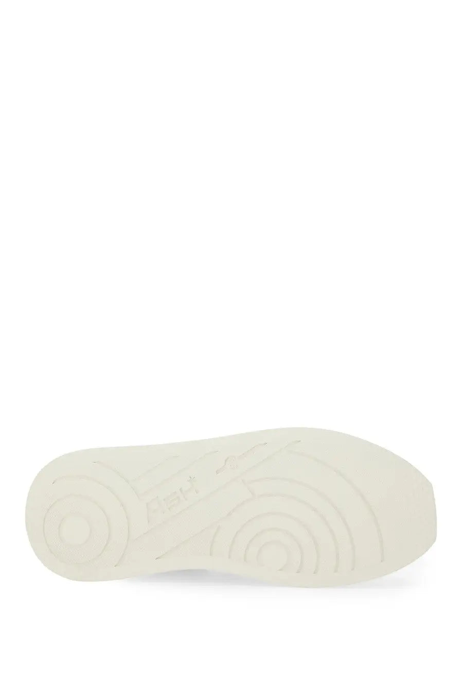 Off-white rubber sole with concentric circular tread patterns on ash women’s iconic sneaker white