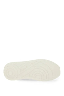 Off-white rubber sole with concentric circular tread patterns on ash women’s iconic sneaker white