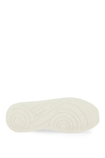Cream-colored rubber sole with embossed circular tread and marr logo on ash women’s icons combo sneaker white