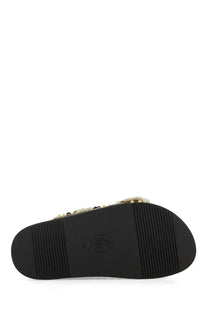 Black rubber sole of ash womens sandal utah bis black with textured grip pattern and small embossed logo in center