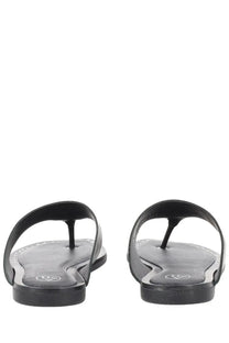 Black leather thong sandals with minimalist design and subtle stitching ash womens sandalo genius black