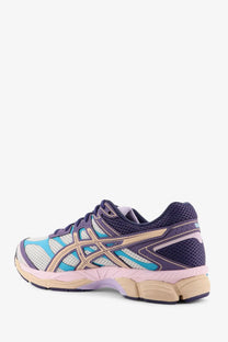 Asics men’s gel cumulus mesh sneakers in purple and blue with mesh upper beige accents and pink midsole
