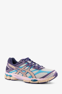 Asics men’s gel cumulus mesh sneakers grey featuring purple and teal gel turbo 16 running shoe with beige midsole and mesh upper