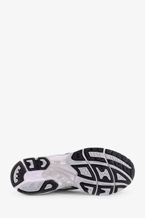 Black and white asics men’s gel kayano low top mesh sneaker with textured rubber outsole and translucent midsole