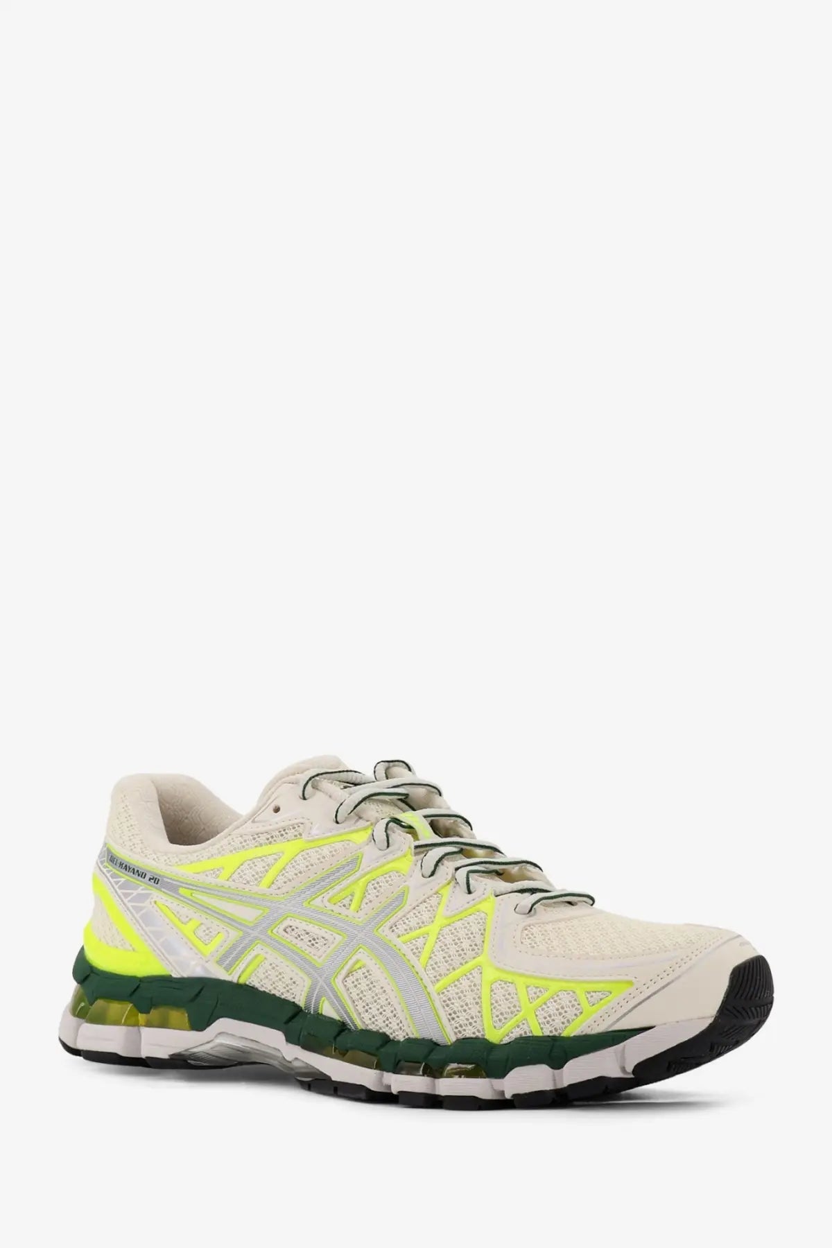 Cream-colored asics men’s gel kayano low top mesh sneaker with neon yellow and dark green breathable mesh upper and gel cushioning