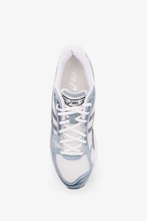 Asics men’s Gel Kayano low top mesh sneakers in white and light gray with signature side stripes and laces