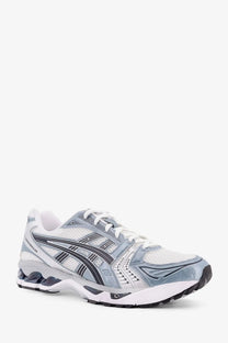 Asics men’s gel kayano 26 low top running shoe in silver white mesh with black accents for athletic use