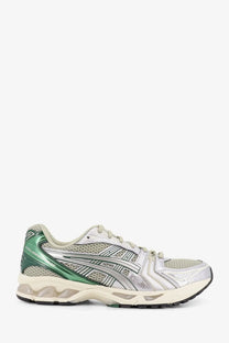Asics men’s gel kayano mesh and rubber sneakers in silver and green with cushioned sole and metallic accents