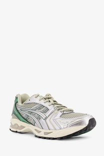 Asics men’s gel kayano green running shoe with silver metallic accents mesh upper and chunky rubber sole