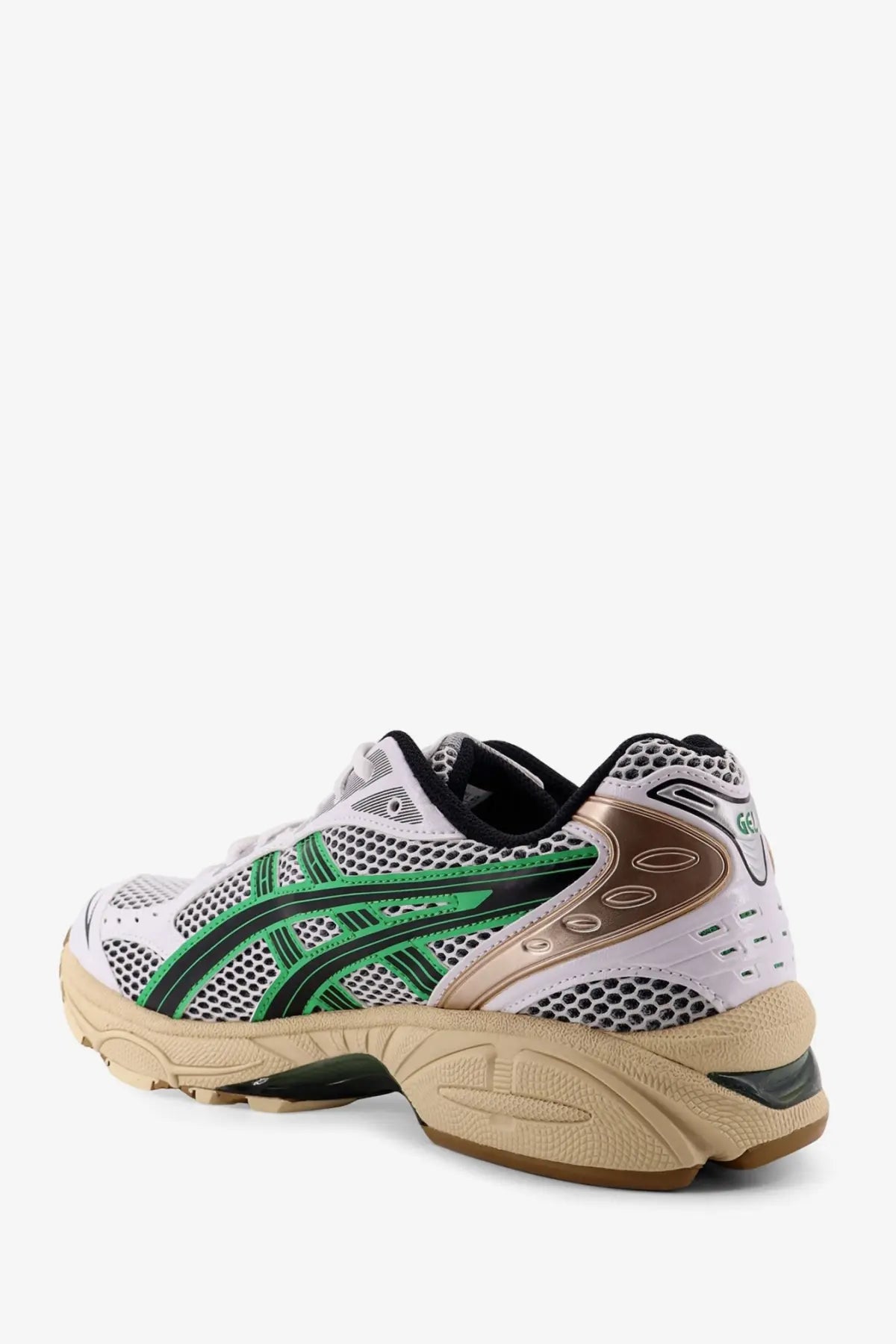 White asics men’s gel kayano mesh sneakers with breathable white mesh upper and green and bronze accents