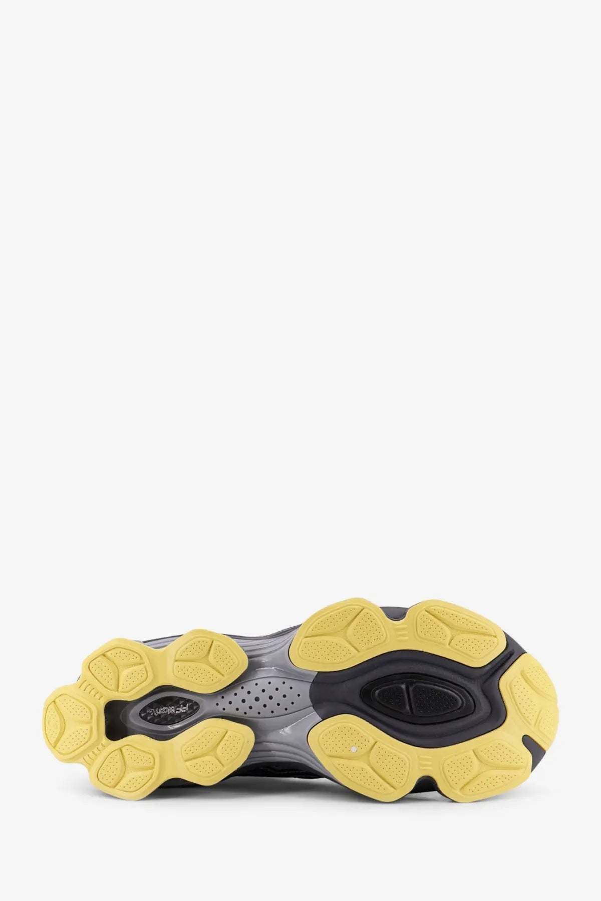 Yellow and black rubber sole with chunky sculpted design on ASICS men’s gel kinetic mesh sneakers multicolor