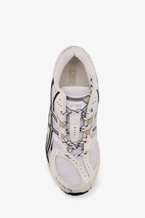 Asics men’s gel nimbus mesh sneakers white with black and beige accents featuring a breathable mesh upper and signature branding