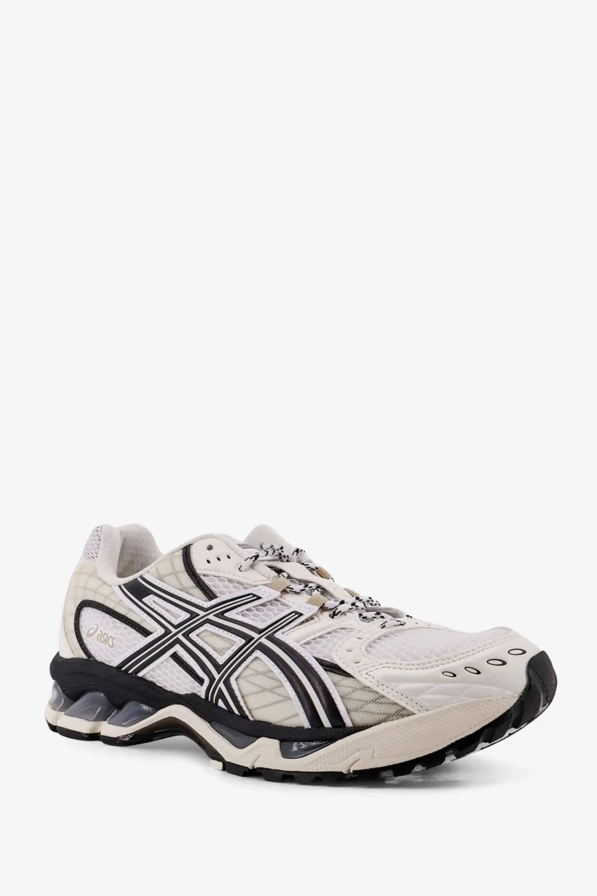 Asics men’s gel nimbus mesh sneakers in white and black with quilted overlays and chunky rubber sole
